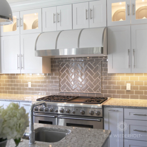 Glass subway tiles with herringbone section