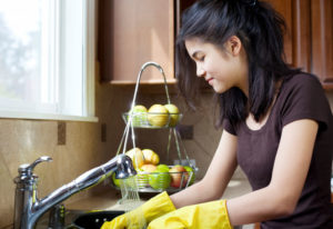 washing dishes before showing a house