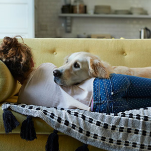 dog and girl on couch