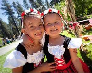 Adorable little girls at Camp Richardson Oktoberfest