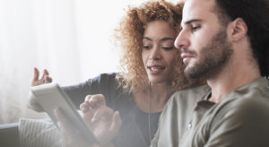 Young couple looking at internet