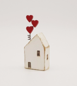 little wood house with hearts