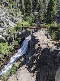 Eagle Falls Trailhead with bridge and waterfall